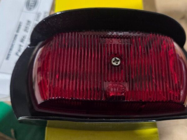 Hella 2038 / 2037 Red Light With Metal Safety Guard (120 X 65 X 35mm) NOS