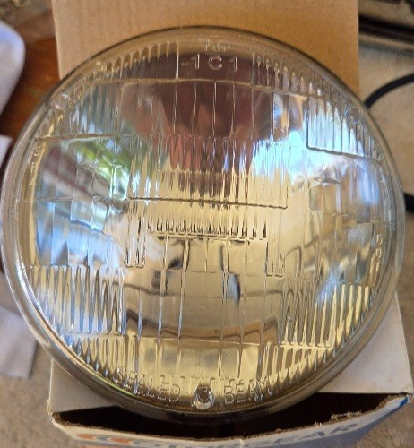 Headlight sealed Beam BSB51/50 12V 50W 5/3/4" 146mm NOS